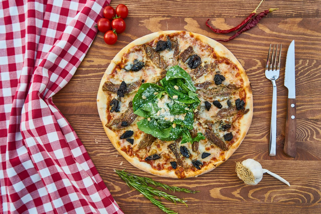The Stone Oven Special pizza — loaded with pepperoni, ham, kabana, pastrami, capsicum and mozzarella